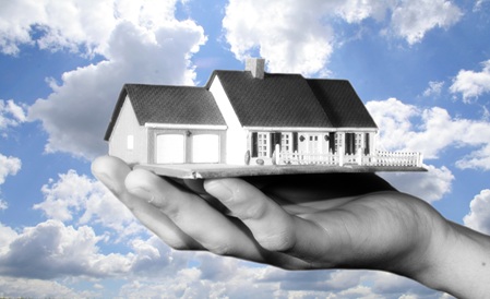 Haus auf einer Hand
